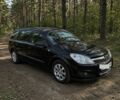 Черный Опель Астра, объемом двигателя 1.4 л и пробегом 250 тыс. км за 5400 $, фото 1 на Automoto.ua