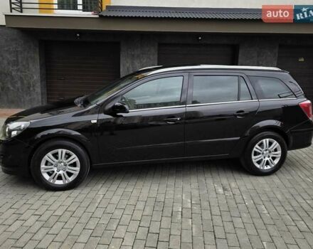 Черный Опель Астра, объемом двигателя 1.7 л и пробегом 224 тыс. км за 5599 $, фото 4 на Automoto.ua