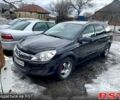 Черный Опель Астра, объемом двигателя 1.9 л и пробегом 220 тыс. км за 4300 $, фото 1 на Automoto.ua