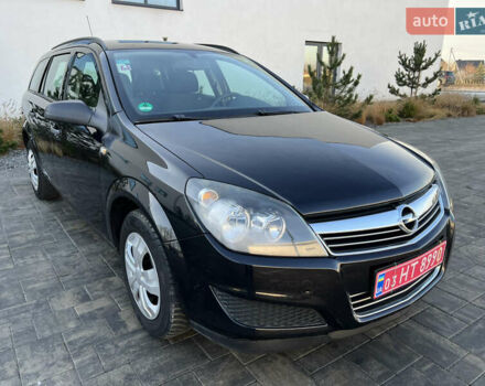 Черный Опель Астра, объемом двигателя 1.4 л и пробегом 242 тыс. км за 4450 $, фото 24 на Automoto.ua