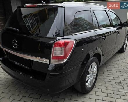 Черный Опель Астра, объемом двигателя 1.7 л и пробегом 224 тыс. км за 5650 $, фото 9 на Automoto.ua