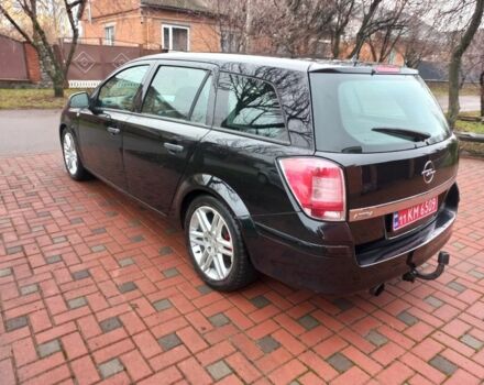 Черный Опель Астра, объемом двигателя 1.8 л и пробегом 200 тыс. км за 5750 $, фото 6 на Automoto.ua