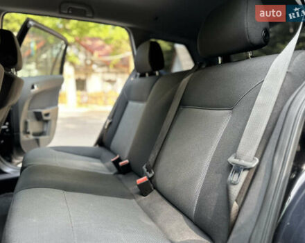 Черный Опель Астра, объемом двигателя 1.6 л и пробегом 157 тыс. км за 5499 $, фото 135 на Automoto.ua