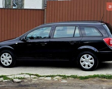 Черный Опель Астра, объемом двигателя 1.6 л и пробегом 238 тыс. км за 6299 $, фото 29 на Automoto.ua