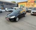 Черный Опель Астра, объемом двигателя 1.4 л и пробегом 170 тыс. км за 4900 $, фото 3 на Automoto.ua