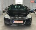 Черный Опель Астра, объемом двигателя 1.6 л и пробегом 186 тыс. км за 6799 $, фото 1 на Automoto.ua