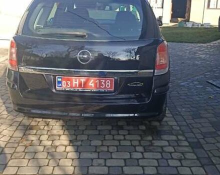 Черный Опель Астра, объемом двигателя 1.6 л и пробегом 249 тыс. км за 5650 $, фото 3 на Automoto.ua