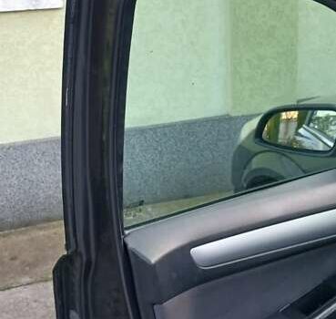 Черный Опель Астра, объемом двигателя 1.8 л и пробегом 164 тыс. км за 5500 $, фото 11 на Automoto.ua