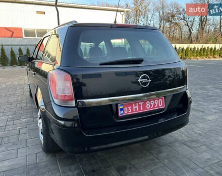 Черный Опель Астра, объемом двигателя 1.4 л и пробегом 242 тыс. км за 4450 $, фото 14 на Automoto.ua