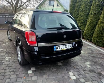 Черный Опель Астра, объемом двигателя 1.6 л и пробегом 220 тыс. км за 5800 $, фото 2 на Automoto.ua