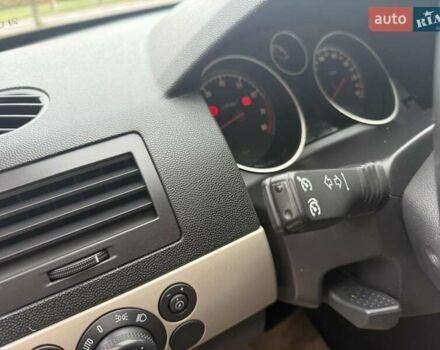 Черный Опель Астра, объемом двигателя 1.6 л и пробегом 240 тыс. км за 5550 $, фото 11 на Automoto.ua