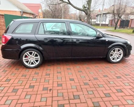 Черный Опель Астра, объемом двигателя 1.8 л и пробегом 200 тыс. км за 5750 $, фото 3 на Automoto.ua