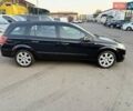 Черный Опель Астра, объемом двигателя 1.4 л и пробегом 170 тыс. км за 4900 $, фото 7 на Automoto.ua