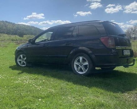 Черный Опель Астра, объемом двигателя 1.69 л и пробегом 250 тыс. км за 6500 $, фото 6 на Automoto.ua