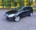 Черный Опель Астра, объемом двигателя 1.6 л и пробегом 186 тыс. км за 6100 $, фото 1 на Automoto.ua