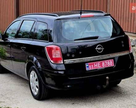 Черный Опель Астра, объемом двигателя 1.6 л и пробегом 238 тыс. км за 6299 $, фото 24 на Automoto.ua
