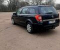 Черный Опель Астра, объемом двигателя 1.4 л и пробегом 214 тыс. км за 4950 $, фото 3 на Automoto.ua