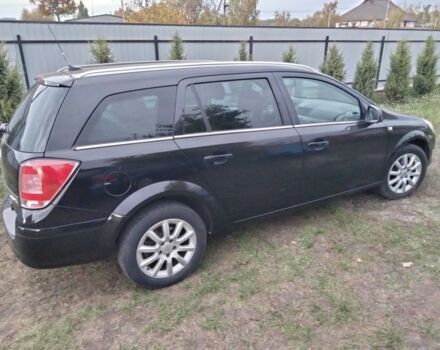 Черный Опель Астра, объемом двигателя 1.4 л и пробегом 218 тыс. км за 4550 $, фото 5 на Automoto.ua
