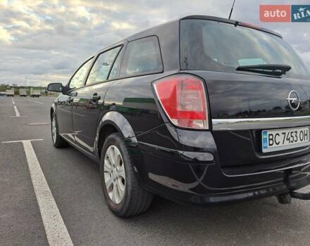 Черный Опель Астра, объемом двигателя 1.6 л и пробегом 212 тыс. км за 5200 $, фото 7 на Automoto.ua