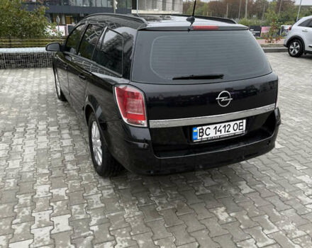 Черный Опель Астра, объемом двигателя 1.9 л и пробегом 255 тыс. км за 6200 $, фото 4 на Automoto.ua