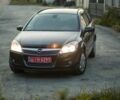 Черный Опель Астра, объемом двигателя 1.6 л и пробегом 142 тыс. км за 5640 $, фото 1 на Automoto.ua