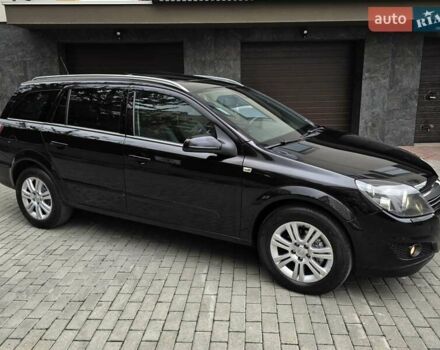 Черный Опель Астра, объемом двигателя 1.7 л и пробегом 224 тыс. км за 5650 $, фото 12 на Automoto.ua