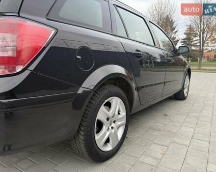 Черный Опель Астра, объемом двигателя 1.6 л и пробегом 240 тыс. км за 5550 $, фото 4 на Automoto.ua