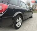 Черный Опель Астра, объемом двигателя 1.6 л и пробегом 240 тыс. км за 5550 $, фото 4 на Automoto.ua