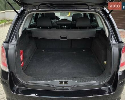 Черный Опель Астра, объемом двигателя 1.7 л и пробегом 224 тыс. км за 5650 $, фото 29 на Automoto.ua