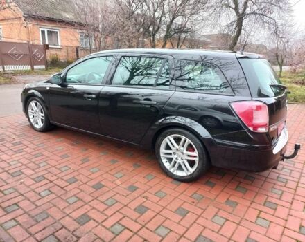 Черный Опель Астра, объемом двигателя 1.8 л и пробегом 200 тыс. км за 5750 $, фото 7 на Automoto.ua