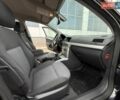 Черный Опель Астра, объемом двигателя 1.6 л и пробегом 187 тыс. км за 5500 $, фото 48 на Automoto.ua