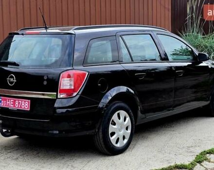 Черный Опель Астра, объемом двигателя 1.6 л и пробегом 238 тыс. км за 6299 $, фото 19 на Automoto.ua