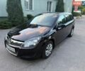 Черный Опель Астра, объемом двигателя 1.4 л и пробегом 228 тыс. км за 5700 $, фото 1 на Automoto.ua