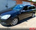 Черный Опель Астра, объемом двигателя 1.6 л и пробегом 210 тыс. км за 6700 $, фото 1 на Automoto.ua