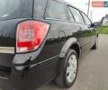 Черный Опель Астра, объемом двигателя 1.6 л и пробегом 250 тыс. км за 5750 $, фото 11 на Automoto.ua