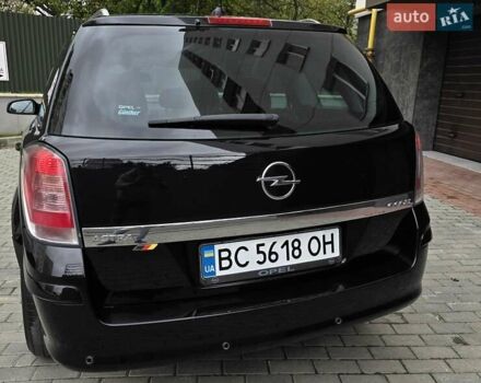 Черный Опель Астра, объемом двигателя 1.7 л и пробегом 224 тыс. км за 5599 $, фото 7 на Automoto.ua
