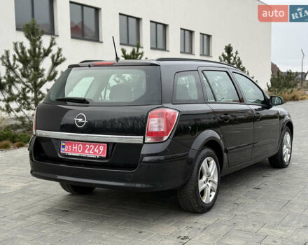 Черный Опель Астра, объемом двигателя 1.6 л и пробегом 215 тыс. км за 5350 $, фото 10 на Automoto.ua