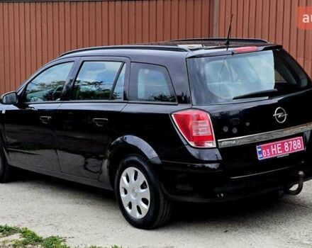 Черный Опель Астра, объемом двигателя 1.6 л и пробегом 238 тыс. км за 6299 $, фото 26 на Automoto.ua