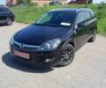 Черный Опель Астра, объемом двигателя 1.8 л и пробегом 220 тыс. км за 6400 $, фото 1 на Automoto.ua
