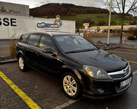 Черный Опель Астра, объемом двигателя 1.69 л и пробегом 268 тыс. км за 8000 $, фото 2 на Automoto.ua