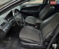 Черный Опель Астра, объемом двигателя 1.7 л и пробегом 224 тыс. км за 5650 $, фото 22 на Automoto.ua