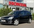 Черный Опель Астра, объемом двигателя 1.6 л и пробегом 153 тыс. км за 5600 $, фото 1 на Automoto.ua