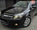 Черный Опель Астра, объемом двигателя 1.7 л и пробегом 224 тыс. км за 5650 $, фото 1 на Automoto.ua