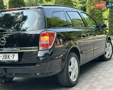 Черный Опель Астра, объемом двигателя 1.6 л и пробегом 157 тыс. км за 5499 $, фото 52 на Automoto.ua