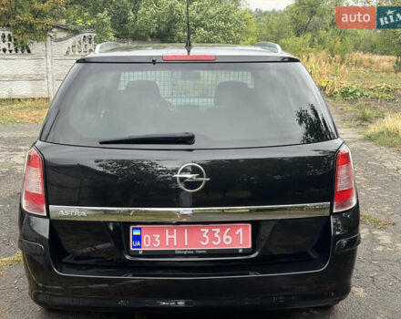 Черный Опель Астра, объемом двигателя 1.6 л и пробегом 210 тыс. км за 6400 $, фото 4 на Automoto.ua