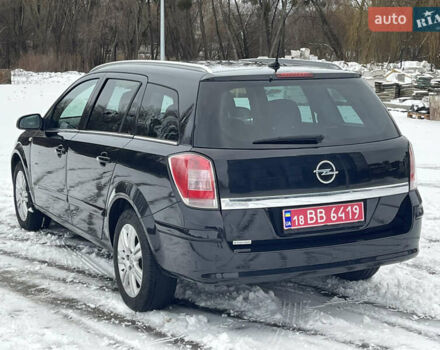 Черный Опель Астра, объемом двигателя 1.6 л и пробегом 148 тыс. км за 6300 $, фото 6 на Automoto.ua