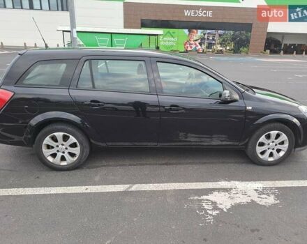 Черный Опель Астра, объемом двигателя 1.6 л и пробегом 212 тыс. км за 5200 $, фото 13 на Automoto.ua