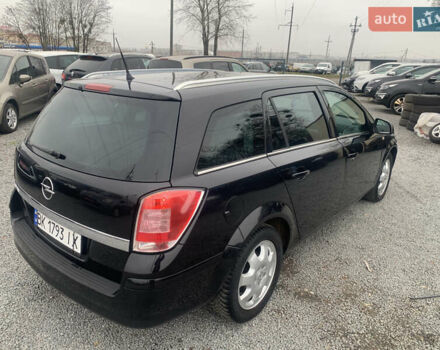 Черный Опель Астра, объемом двигателя 1.6 л и пробегом 232 тыс. км за 5500 $, фото 7 на Automoto.ua