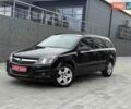 Черный Опель Астра, объемом двигателя 1.6 л и пробегом 240 тыс. км за 5550 $, фото 1 на Automoto.ua