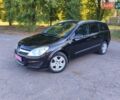 Черный Опель Астра, объемом двигателя 1.6 л и пробегом 186 тыс. км за 6100 $, фото 1 на Automoto.ua